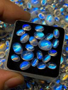 มูนสโตนสีขาวรุ้งรูปไข่แบบคาโบชอง  พร้อมแสงสีฟ้า  ขนาด 6x4 มม. ถึง 10x14 มม. สำหรับทำเครื่องประดับ - Product Image 5