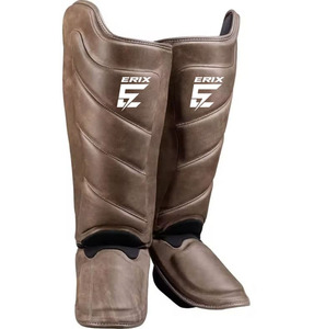 Protège-tibias de boxe de haute qualité pour Muay Thai et Kickboxing, protection du cou-de-pied en cuir, fermeture réglable, pour l'entraînement sportif - Product Image 1