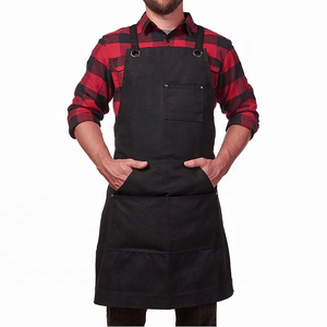 Delantal de lona negro con bolsillos y correas ajustables para barberos y peluqueros, en oferta, impermeable y resistente al aceite. - Product Image 1