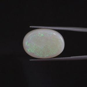โอปอลสีขาวธรรมชาติ พลอยหลวม 14.08 กะรัต รูปทรงวงรี 21.5x15 มม. รับรองโดย IGI ขัดเงาด้วยมือ ลงแว็กซ์/น้ำมัน ขายส่งราคาเบาๆ - Product Image 1