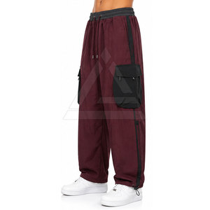 Pantalon parachute décontracté pour homme avec jambes larges, taille élastique, plusieurs poches et design streetwear pour tous les jours - Product Image 5