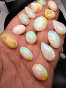 Opale d'Éthiopie naturelle blanche de qualité supérieure AAA+ 401,80 CT, 49 pièces, formes mélangées, cabochon, jeu de couleurs, pour la fabrication de bijoux/les collectionneurs Zehra - Product Image 3