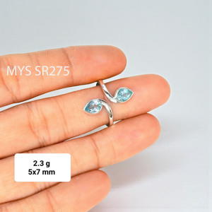 แหวนเงินแท้ 925 น้ำหนักเบา ทำมือ สำหรับทุกเพศ ประดับบลูโทแพซทรงรีเจียระไนสวยงาม แหวนดีไซน์โดดเด่น พลอยเจียระไนอย่างน่าทึ่ง - Product Image 2