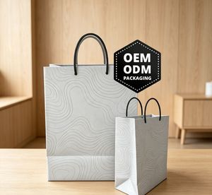 Sac en papier personnalisé avec logo OEM pour l'emballage de boutiques - Product Image 1