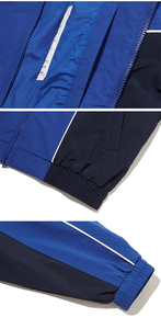 Ensemble de survêtement pour homme, bleu, à blocs de couleur, en polyester tricoté, respirant, col montant, style sportif décontracté, coupe-vent, en vente en ligne - Product Image 3