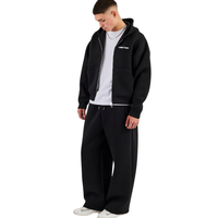 Ensemble de survêtement deux pièces pour homme avec sweat à capuche zippé, poches latérales, pantalon à taille élastique, jambe large et ourlet ouvert, coupe décontractée