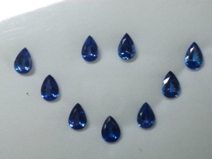 Tanzanita Natural de 7x10mm, 9 Piezas, Calidad 3A, Corte Facetado en Forma de Pera, para Joyería, Piedra de Nacimiento Suelta, GEMFORTE INC - Product Image 2