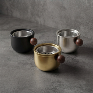 Compact Rounded Metal Incense <b>Burners</b> In Black Gold And Silver Finishes Each Featuring <b>Side</b> Wooden Ball Handles And Mesh Inserts - Product Image 1