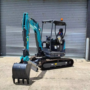 Excavadora Compacta Usada de 3000 kg, Color Amarillo, con Cuchilla Topadora Frontal y Orugas de Goma para un Nivelado Residencial Preciso - Product Image 1