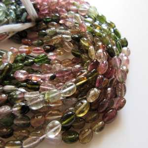 ลูกปัดทัวร์มาลีนสีชมพูเขียวธรรมชาติทรงรี เรียบเนียน รูปทรงแตงโม พลอยทัวร์มาลีนหลากสี ร้อยเป็นเส้น หินเม็ดเดี่ยว - Product Image 1