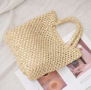 Upgrade your daily accessory collection with this premium Natural yarn bag designed with a classic square body and <b>top</b> grips - Product Image 2