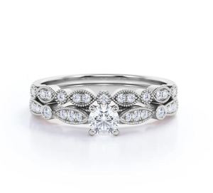 Anillo de Boda Chapado en Oro con Moissanita de Corte Redondo de 0.75 Quilates, Estilo Art Deco, para Mujer, en Oro Blanco - Product Image 1