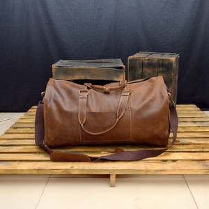 กระเป๋าเดินทางหนังวัวแท้สไตล์เรโทร ขนาด 36-55 ลิตร น้ำหนักเบา พกพาสะดวก สำหรับเดินทางท่องเที่ยวหรือธุรกิจ รุ่น LDB-0305 เหมาะสำหรับทั้งชายและหญิง - Product Image 3