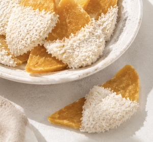 Crispy Coconut Flakes and 65% Cocoa White Chocolate on Soft Dried Mango Slices for Tropical Gourmet Snacking - Product Image 3