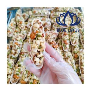 Disponible : Tarte artisanale végétalienne à base de plantes, aux noix et pistaches mélangées, gâteau écologique, collation - Product Image 1