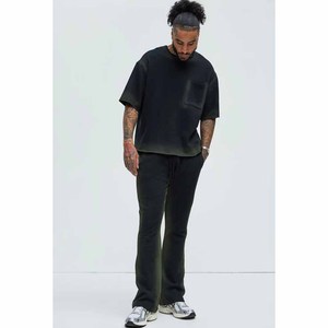 Conjunto Deportivo de Algodón Negro para Hombre, Cuello Redondo, Manga Corta, Color Sólido, Corte Holgado, Pantalones Largos Casuales con Bolsillos Laterales - Product Image 5