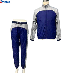 Conjunto Deportivo Personalizado para Hombre, Estilo Jogger, Color Azul Marino y Gris, Bloques de Color, Manga Larga, Cuello Alto, Cortavientos, Unisex - Product Image 4