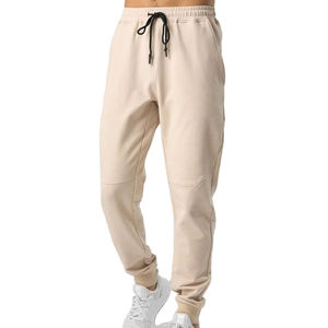 Pantalon de jogging en coton uni beige pour homme avec cordon de serrage à la taille et poches latérales, décontracté, longueur complète, respirant, coupe régulière, automne - Product Image 1