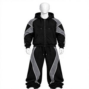 Survêtement à capuche zippé noir et gris avec empiècements contrastants incurvés et une silhouette athlétique audacieuse pour un style streetwear moderne - Product Image 1