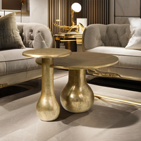 Table d'appoint moderne en aluminium avec finition dorée et plateau rond pour salon et chambre à coucher