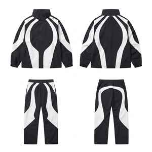 Ensemble survêtement streetwear homme personnalisé 2 pièces, coupe ample, léger, avec panneaux et passepoil, veste et pantalon en nylon - Product Image 1