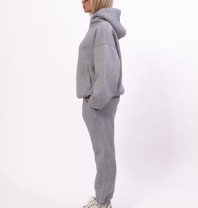 Conjunto deportivo de mujer OEM/ODM 100% algodón, corte holgado, sudadera con hombros caídos y pantalones, logotipo personalizado con impresión DTF, chándal para mujer - Product Image 6