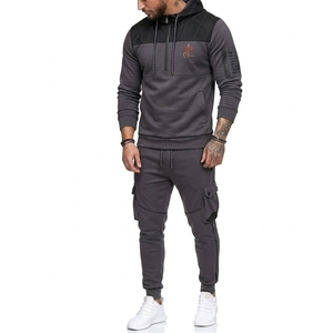 Chándal premium para hombre hecho con tela transpirable que ofrece comodidad, flexibilidad y estilo moderno durante todo el día, para deportes y uso casual. - Product Image 1