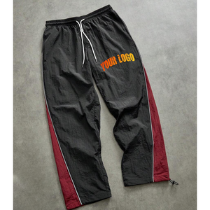 Pantalones de chándal de nailon con botones personalizados estilo urbano para hombre, venta al por mayor directa de fábrica, de pierna ancha acampanada, cortavientos - Product Image 4