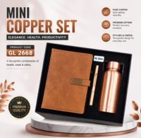 Coffret cadeau en cuivre de qualité supérieure avec un carnet en similicuir A5, un stylo en métal et une bouteille d'eau en cuivre pur pour les cadeaux d'entreprise.