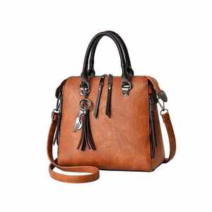 กระเป๋าถือสะพายไหล่แฟชั่นผู้หญิงขายส่งปี 2026 หนังแท้ กระเป๋าถือสีดำ ซิปกันน้ำ ความจุเยอะ ราคาสมเหตุสมผล - Product Image 3