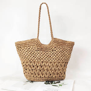 Experience effortless elegance with this stunning Natural yarn bag featuring a carved <b>top</b> line and a patterned bottom accent - Product Image 3