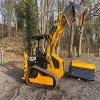 Chargeuse compacte sur chenilles JCB 1CXT d'occasion, moteur 49 CV, pompe hydraulique, chargeuse frontale, rétrocaveuse, équipement de chantier, usage industriel