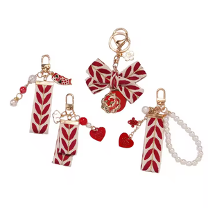 Porte-clés en cuir multi-brins de qualité supérieure, artisanal, fabriqué en Inde, avec broderie perlée, écologique, fait main - Product Image 1