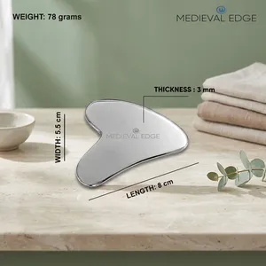 Masseur facial Gua Sha en acier inoxydable en forme de cœur, style médiéval, application manuelle sur le visage en cuivre, provenant de l'Uttar Pradesh - Product Image 2