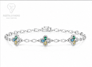 Elegante pulsera tipo station en oro blanco de 18 quilates con motivos florales y diamantes cultivados en laboratorio de colores vibrantes en tonos azul, amarillo y verde. - Product Image 5