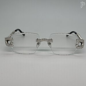 Lunettes de soleil unisexes avec monture géométrique ovale sertie de diamants, verres transparents, fabrication artisanale. - Product Image 1