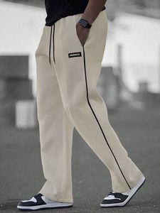 Nouveau pantalon de survêtement décontracté pour homme, beige, taille élastique, bande latérale, 100 % coton, respirant, tricoté, léger, moderne, pour l'automne - Product Image 1