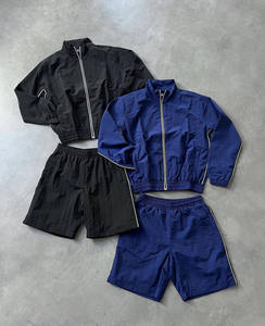 Ensemble survêtement coupe-vent à capuche pour homme de haute qualité, coupe décontractée, respirant, imperméable, 100 % polyester - Product Image 1