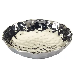 Bol à fruits artisanal en acier inoxydable avec finition miroir de qualité export supérieure, plat de service en métal irrégulier poli fait main - Product Image 1