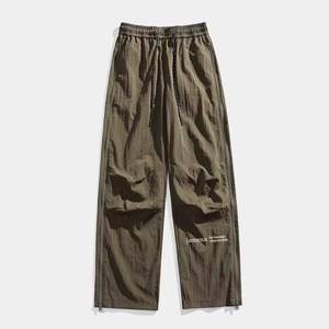 Pantalones de chándal anchos de nailon ligero con cremallera lateral personalizada para hombre, estilo urbano, cortavientos, joggers de hip hop al por mayor - Product Image 1