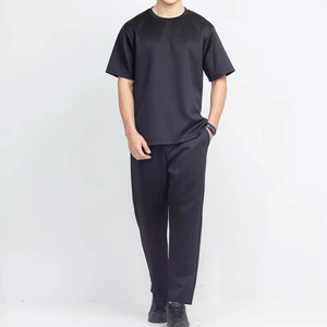 Ensemble de survêtement décontracté pour homme, noir, à séchage rapide, t-shirt à manches courtes, col rond, pantalon long, poches latérales, léger, été - Product Image 1