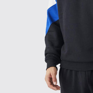 เสื้อสเวตเชิ้ตผู้ชายแบบถักผสมผ้าฟลีซ ตกแต่งด้วยผ้าแบบแพทช์เวิร์ค สำหรับกิจกรรมกลางแจ้ง ทรงยาว ระบายอากาศได้ดี เหมาะสำหรับฤดูหนาว ดีไซน์สีสันตัดกันเป็นแผ่นๆ ทรงโอเวอร์ไซส์ - Product Image 6