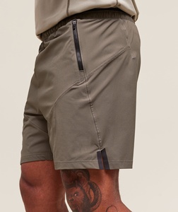 Shorts de sport pour hommes avec poches, respirants, pour la course et l'entraînement, motif uni, tissage non tissé pour la musculation - Product Image 4