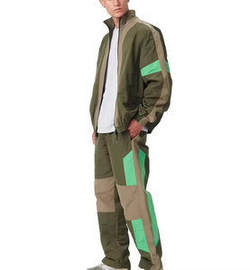 ชุดวอร์มกันลมขายดีสำหรับผู้ชาย ชุดกีฬาพรีเมียม ระบายอากาศได้ดี กันน้ำ เสื้อแจ็คเก็ตและกางเกงจ็อกเกอร์ ผลิตตามสั่ง - Product Image 2