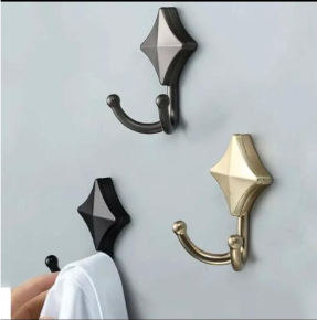 Wall mounted <b>hooks</b> provide elegant solution for organizing coats <b>towels</b> accessories efficiently in home spaces - Product Image 1