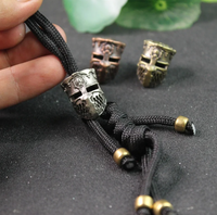 Croisé samouraï casque couteau perles lanière pendentifs bricolage Paracord corde perles accessoires rétro garde masque EDC outil breloques laiton