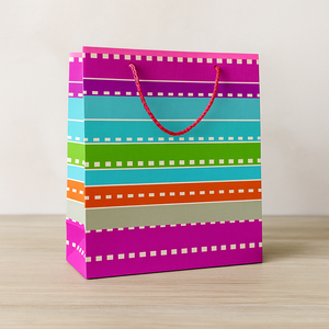 Vibrant multicolor striped gift bag with <b>red</b> rope handle reusable <b>paper</b> tote for birthdays parties weddings and special occasion - Product Image 6