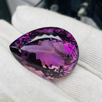 Aigue-marine naturelle taille poire 84,30 carats, grande taille, qualité AAA, lueur violette, coupe et polissage parfaits, certifiée par un tiers