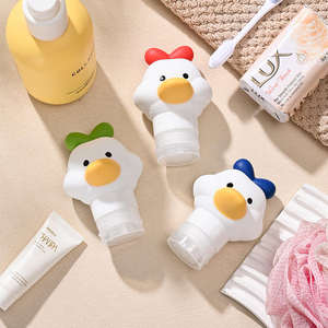 Bouteille distributrice en silicone de 80 ml avec bouchon à clapet et motif mignon de petit canard pour shampoing, cosmétiques, gel douche - Bouteille à presser - Product Image 1
