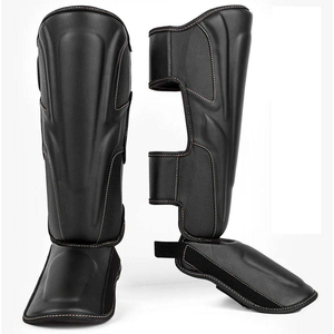 Protectores de Espinillas de Boxeo de Cuero Profesionales de Alta Calidad Personalizados, Plegables, para Muay Thai y Kick Boxing, para Luchadores - Product Image 1